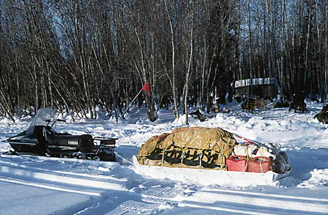 Our snowmachine & sled at Tolavana Lodge